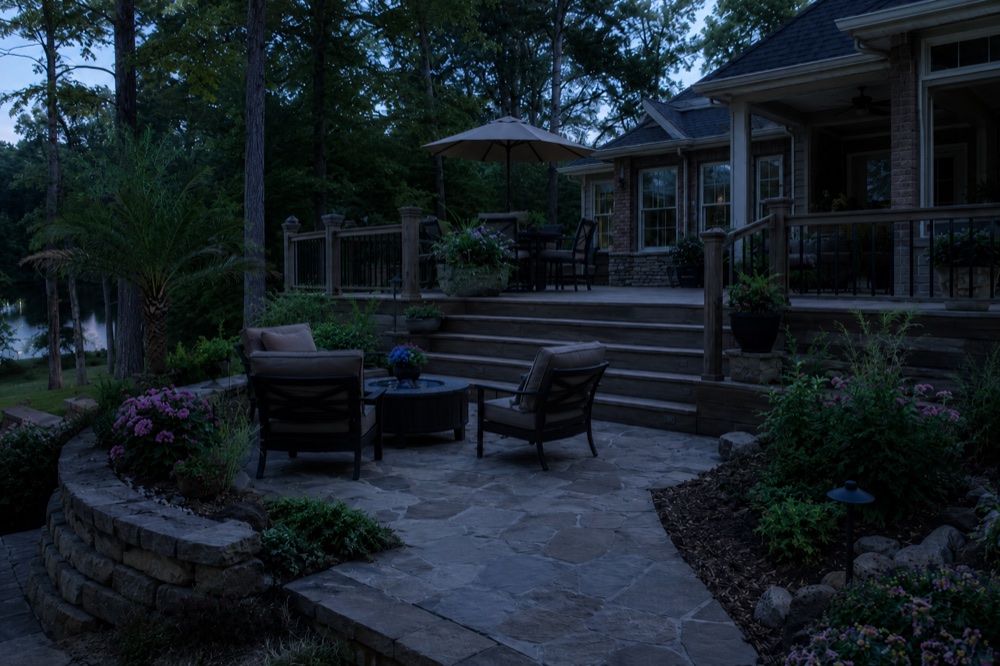 The same Lake Norman dock and waterfront at dusk before outdoor lighting was installed